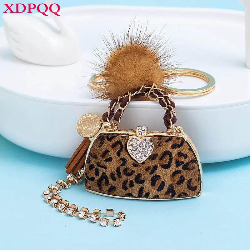 Trendy Leopard Print Mini Purse - Chic Style with Pompom & Gold Keychain” - Glamourize 