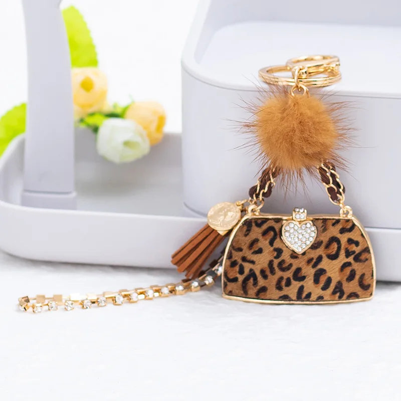 Trendy Leopard Print Mini Purse - Chic Style with Pompom & Gold Keychain” - Glamourize 