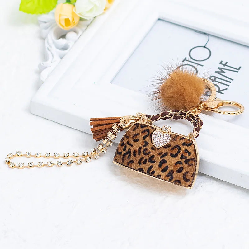 Trendy Leopard Print Mini Purse - Chic Style with Pompom & Gold Keychain” - Glamourize 