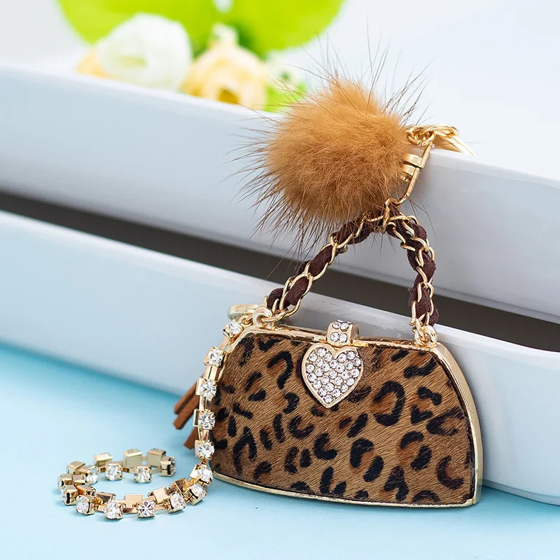 Trendy Leopard Print Mini Purse - Chic Style with Pompom & Gold Keychain” - Glamourize 